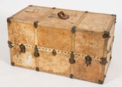 A French ivory leather and brass studded steamer trunk:,