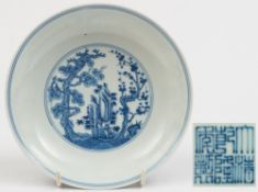 A Chinese blue and white 'Three Friends of Winter' saucer dish: painted with a central roundel of