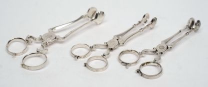 A pair of Georgian silver sugar nips,
