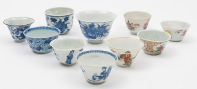 A collection of ten Chinese small bowls and teabowls: comprising a blue and white wine cup painted