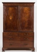 A George III mahogany and inlaid linen press:, the upper part with a moulded dentil cornice,