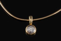 An 18ct gold and diamond single-stone pendant:, the circular,
