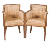 Heals - A set of four light oak club armchairs:,