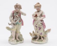 A pair of Derby figures of French Shepherds: modelled as a boy and girl,