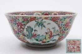 A Chinese famille rose medallion bowl: the exterior painted with figures,