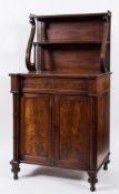 A Regency mahogany chiffonier:, of small size and recessed breakfront outline,