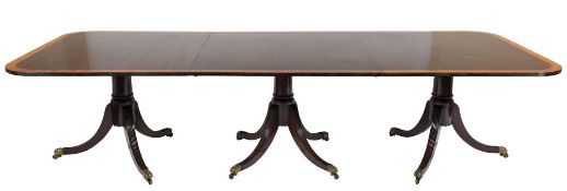 A mahogany and inlaid three pillar dining table:,