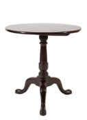 A mid 18th Century mahogany circular tea table:,