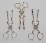 A pair of Georgian silver sugar nips,