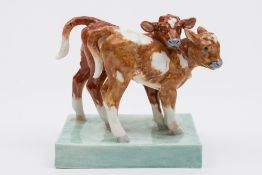 A Royal Worcester figure 'Calves' modelled by Doris Lindner: the two calves standing on a