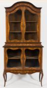 An Edwardian mahogany and floral marquetry domed display cabinet:, in two parts,