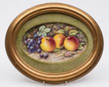 A porcelain plaque in the Royal Worcester manner: of oval form painted by Bryan Cox with apples,