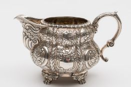 A George IV Irish silver baluster milk jug maker Edward Crofton, Dublin, 1823,