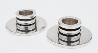 A pair of Georg Jensen silver candlesticks designed by Harold Nielson: fully stamped, 747A,