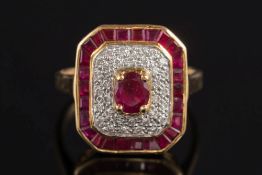 A modern 18ct gold, ruby and diamond mounted rectangular cluster ring: with central oval ruby 5.0mm.