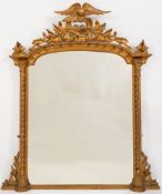 A Victorian carved giltwood and gesso domed overmantel mirror:,