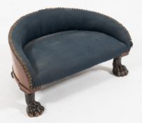 An unusual 19th Century mahogany half round stool:, upholstered,