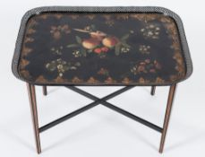 An early 19th Century Pontypool decorated rectangular tray:, on a later stand,