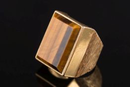A rectangular Tiger's eye single-stone ring:, approximately 20mm long x 17mm wide,