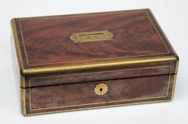 A George IV mahogany and brass mounted travelling vanity case:, of rectangular outline,