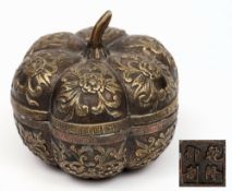 A Chinese brass gourd shaped bowl and cover:, with key pattern decorated rims,
