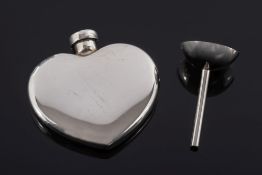 Tiffany and Co. A silver heart-shaped scent flask: with funnel in fitted case.