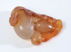 A Chinese carnelian agate carving: of a gourd and foliage,