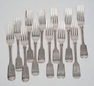 Twelve matched  silver fiddle pattern table forks, various makers and dates: six initialled, 29.
