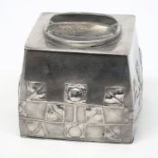 A Tudric pewter biscuit barrel, designed by Archibald Knox: of square outline with lift off lid,