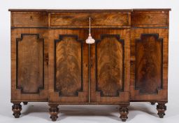 An early 19th Century mahogany and inlaid breakfront low side cupboard:,