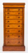 By James Winter & Sons, London - A Victorian mahogany Wellington chest:, with a moulded top,