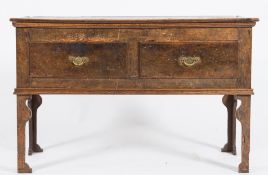 An early 19th Century oak dresser of small size:, the top formerly with a superstructure,