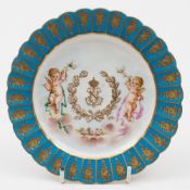 A Sèvres porcelain saucer: of circular form with fluted rim,