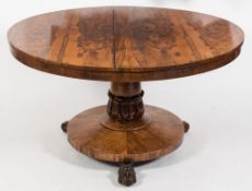 A Victorian rosewood circular breakfast table:,