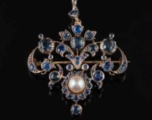 A 19th century sapphire and bouton pearl pendant brooch: of open work,