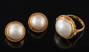 A mabe cultured pearl ring and pair of matching earrings:,