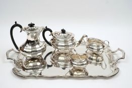 A George V silver four-piece tea service and matching tray, maker Viners Ltd, Sheffield,