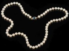 A cultured pearl single string necklace: with rose diamond and aquamarine mounted clasp.