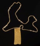 A Victorian guard chain: of pierced design with attached mesh-link purse,
