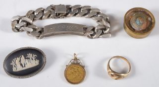 A half sovereign dated '1905', mounted as a pendant:, a snake ring, a silver identity bracelet,