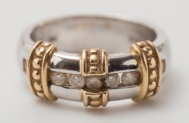 A two colour gold and diamond five-stone ring:.