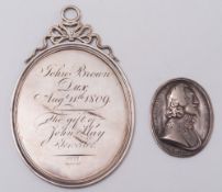 A Charles I Royalist medallion, 4cm total length and an oval presentation plaque dated '1809':,