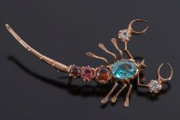 A coloured gem-set scorpion brooch:.