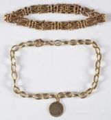 A 9ct gold oval-link bracelet with attached circular pendant,