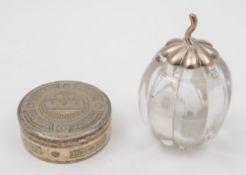 A continental silver engraved circular box: and a Victorian glass perfume bottle in the form of a