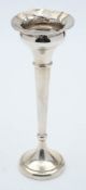 A silver trumpet shaped specimen vase: on slender stem and weighted circular base, 19.5cm. high.