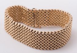 An 18ct gold mesh-link bracelet:, approximately 44gms gross weight.
