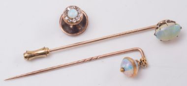 An oval opal single stone stick pin,
