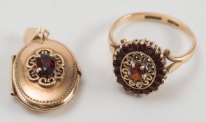A 9ct gold and garnet oval cluster ring and a gold and gem-set pendant locket:.