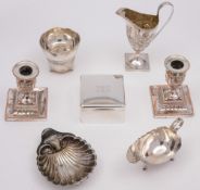 A Georgian  silver pedestal cream jug  with later Victorian decoration, maker  TH, London 1832:,